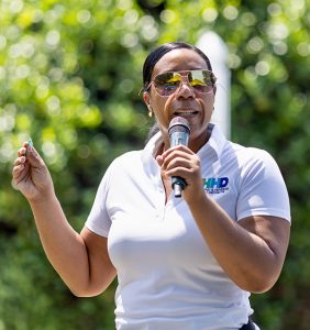 Yovaldi speaking at a community health event